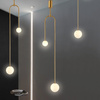 Lampa wisząca LOOP złota 123 cm z białymi kloszami - nowoczesna do salonu